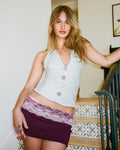 Woman wearing The Tresaire Classic Mini in violet rose with lace waistband overlay